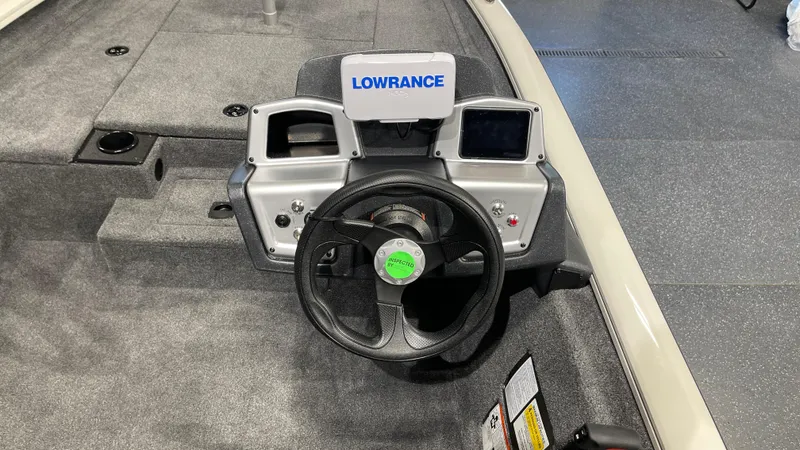 Slide: The Image of 2025 Tracker Pro Team 175 boat dashboard with Lowrance electronics. - 7