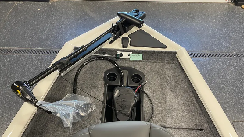 Slide: The Image of 2025 Tracker Pro Team 175 boat interior with trolling motor and control panel. - 9