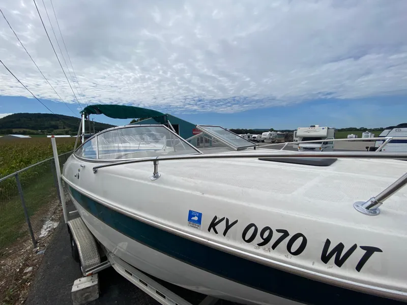 Slide: The Image of 2000 Bayliner 2352 Capri DX/LX boat on trailer, KY 0970 WT registration. - 47