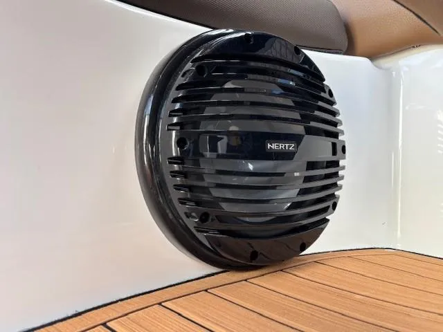 Slide: The Image of Hertz speaker on 2025 Yamaha Boats 252SD with teak flooring. - 12