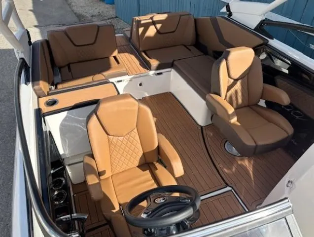 Slide: The Image of Luxurious 2025 Yamaha Boats 252SD interior with tan leather seating and sleek design. - 8
