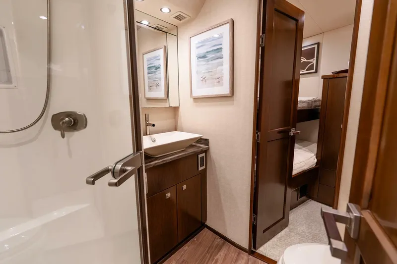 Slide: The Image of Luxurious bathroom interior of 2015 Viking 76 Convertible yacht with modern fixtures. - 35