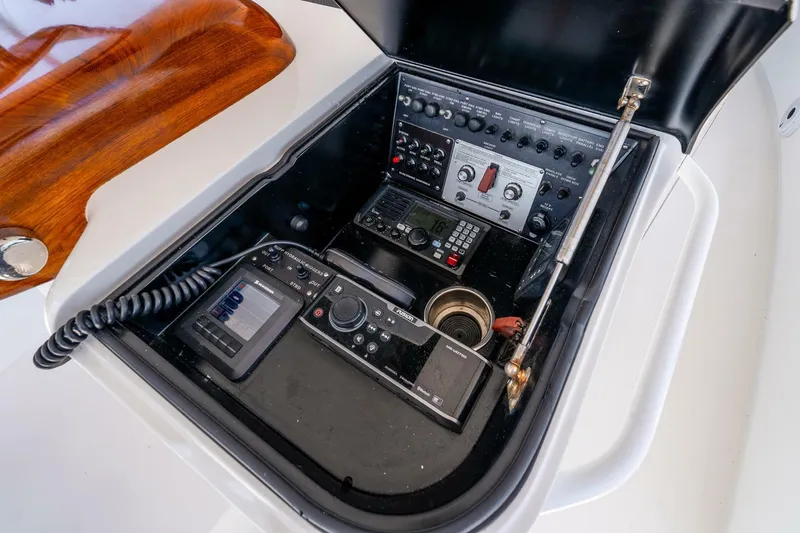 Slide: The Image of Control panel of 2015 Viking 76 Convertible yacht with navigation equipment. - 47