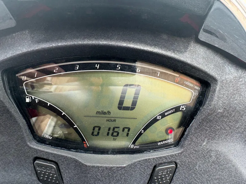Slide: The Image of Kawasaki Ultra 310LX 2011 dashboard displaying 167 hours and zero speed. - 6