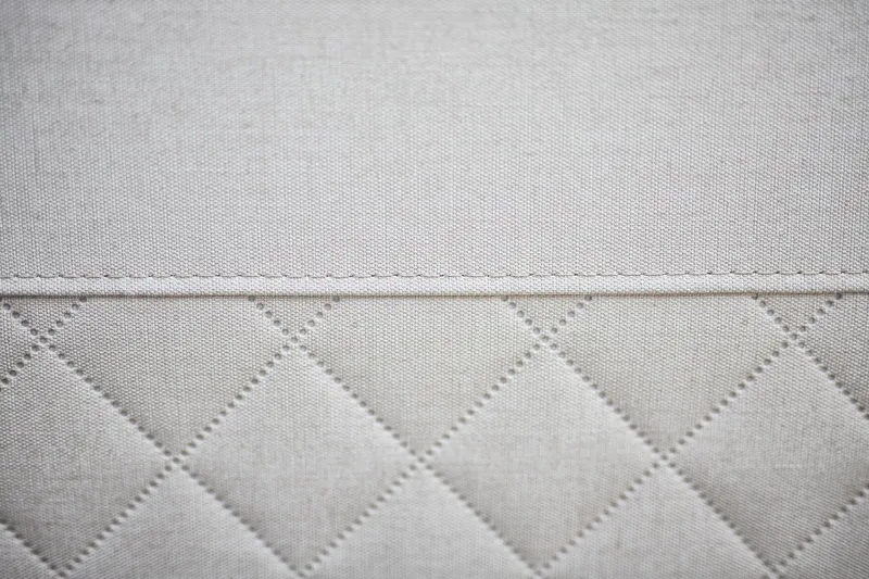 Slide: The Image of Quilted fabric detail of 2024 Skamander Sorrento interior upholstery. - 21