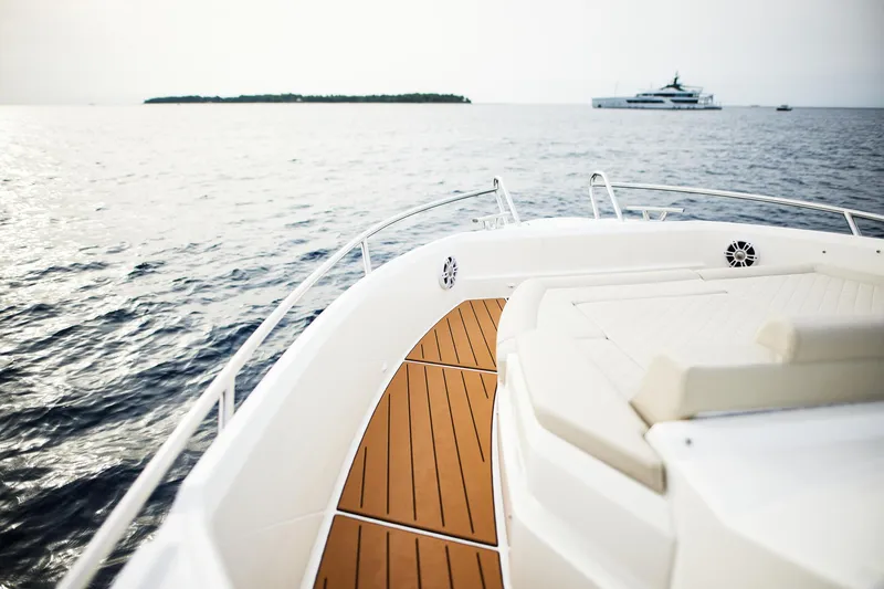 Slide: The Image of 2024 Skamander Sorrento yacht deck with ocean view and distant island. - 24