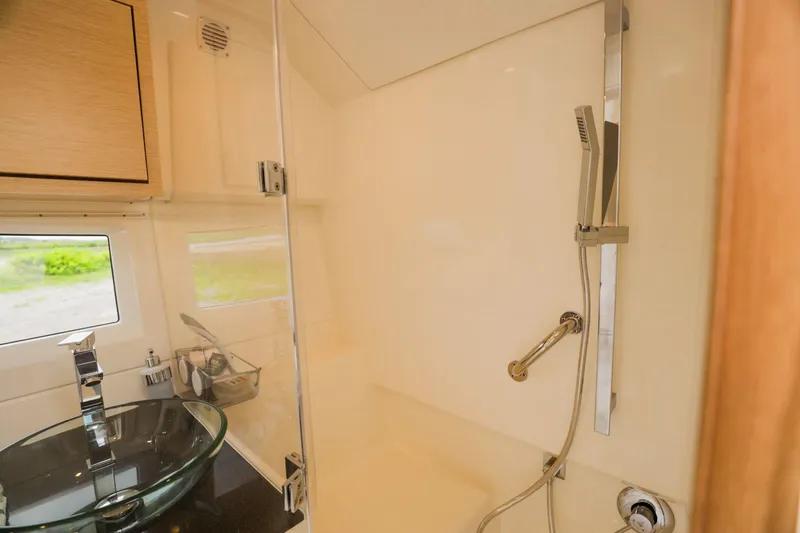 Slide: The Image of 2024 Skamander Sorrento yacht bathroom with modern glass sink and shower. - 42