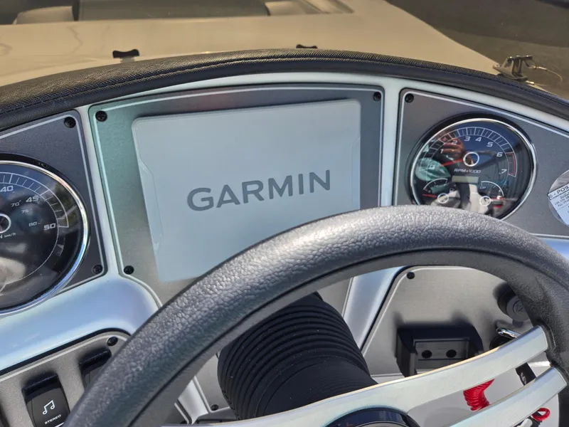 Slide: The Image of Dashboard of 2025 Hurricane SunDeck Sport 192 RL OB with Garmin display and gauges. - 16