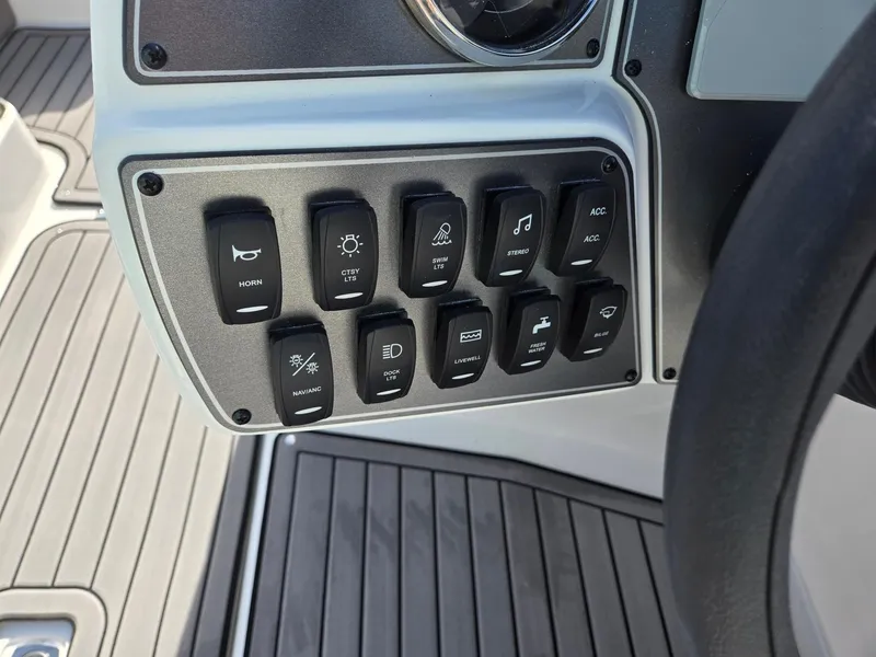 Slide: The Image of Control panel of 2025 Hurricane SunDeck Sport 192 RL OB boat. - 17