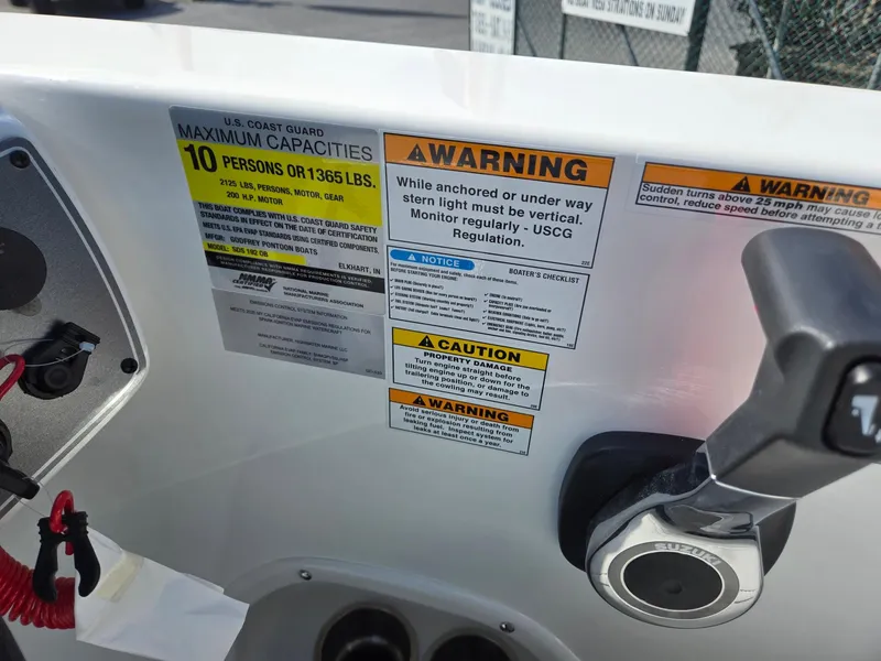 Slide: The Image of Warning labels on 2025 Hurricane SunDeck Sport 192 RL OB boat dashboard. - 19