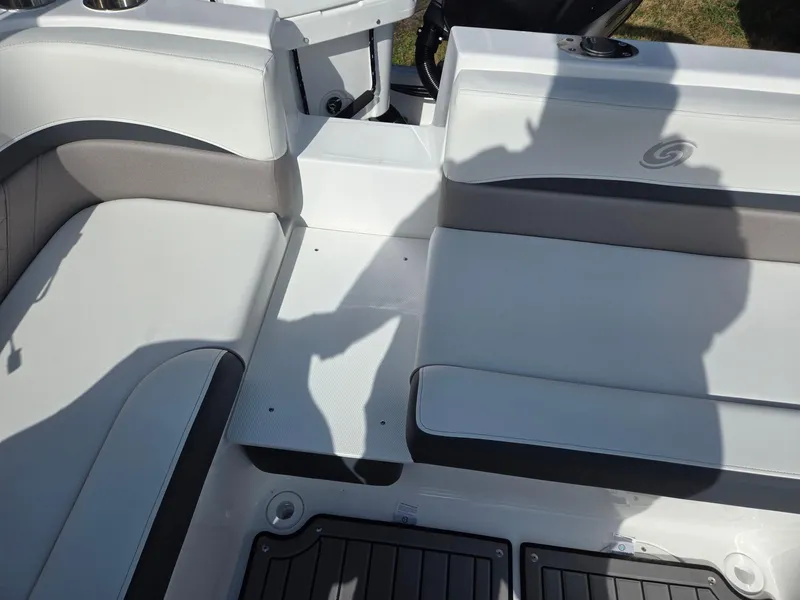 Slide: The Image of 2025 Hurricane SunDeck Sport 192 RL OB boat interior with cushioned seating. - 21