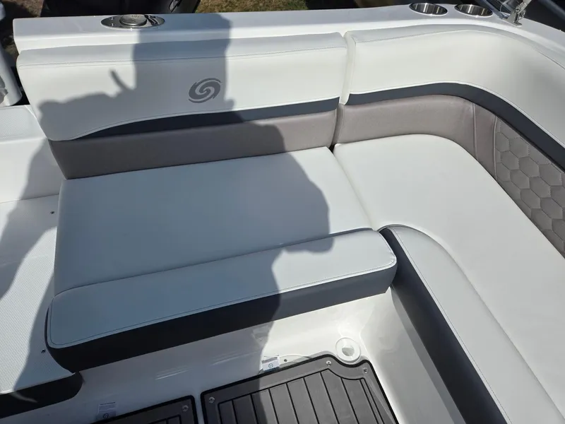 Slide: The Image of 2025 Hurricane SunDeck Sport 192 RL OB boat seating with modern design and cup holders. - 22
