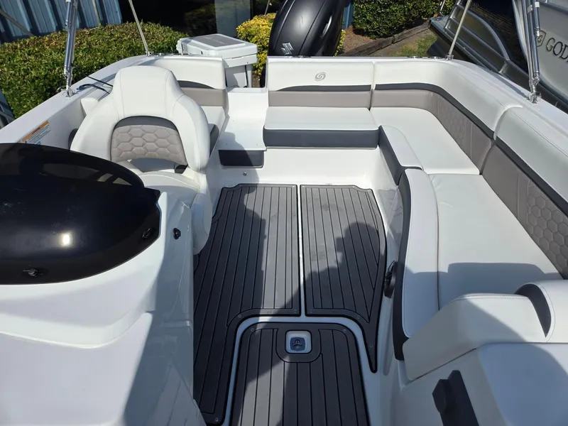 Slide: The Image of 2025 Hurricane SunDeck Sport 192 RL OB boat interior with spacious seating and modern design. - 5