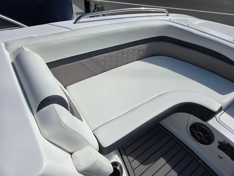 Slide: The Image of 2025 Hurricane SunDeck Sport 192 RL OB boat seating area with sleek white upholstery. - 7