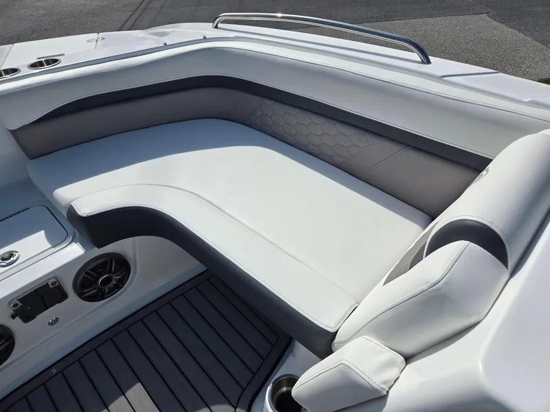 Slide: The Image of 2025 Hurricane SunDeck Sport 192 RL OB boat interior with sleek seating and modern design. - 9