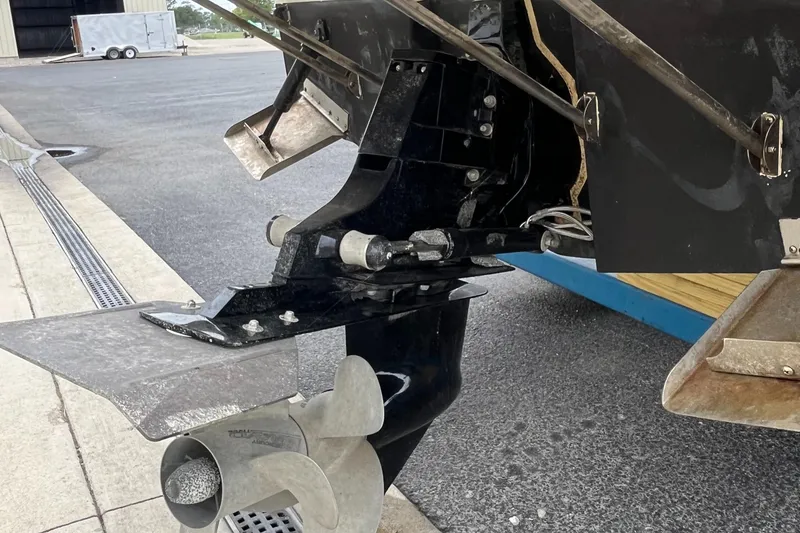 Slide: The Image of 2011 Bayliner 266 Discovery boat propeller and stern drive detail. - 20