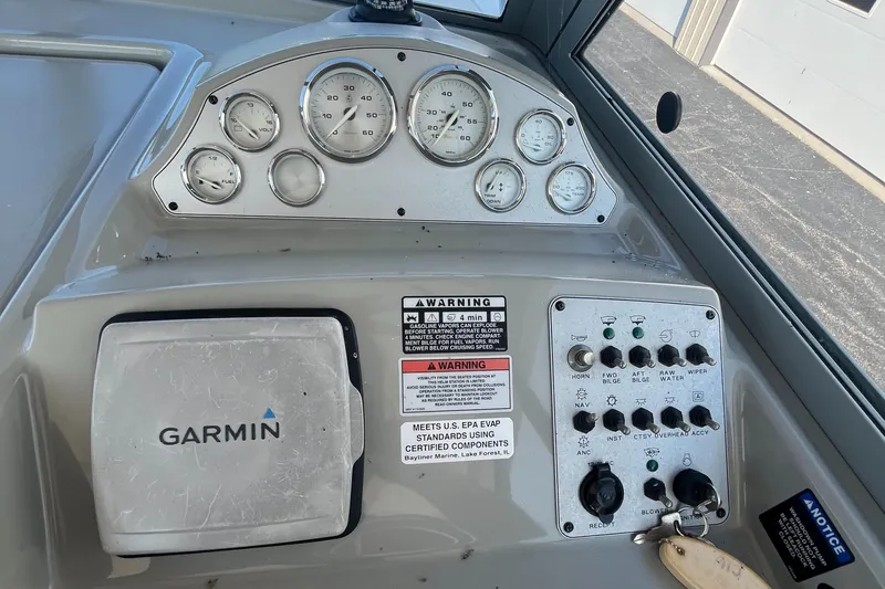 Slide: The Image of Control panel of 2011 Bayliner 266 Discovery boat with Garmin navigation system. - 8