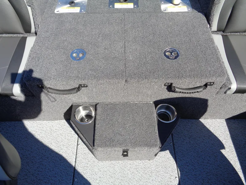 Slide: The Image of 2025 Lund 1875 Pro-V Bass XS boat interior with storage and cup holders. - 28