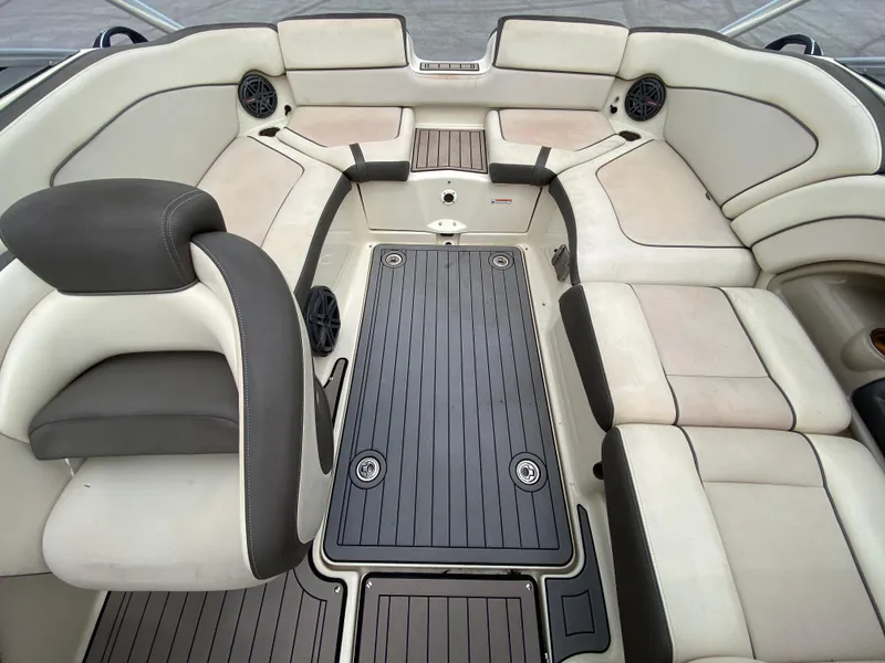 Slide: The Image of Interior of 2014 Yamaha Boats 242 Limited S, featuring spacious seating and sleek design. - 18