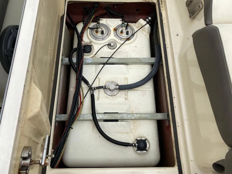 Slide: The Image of 2014 Yamaha Boats 242 Limited S fuel tank with wiring and connections. - 19