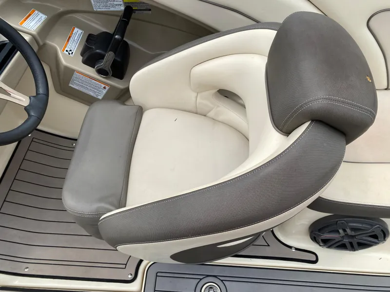 Slide: The Image of 2014 Yamaha Boats 242 Limited S interior seat with gray and white upholstery. - 25