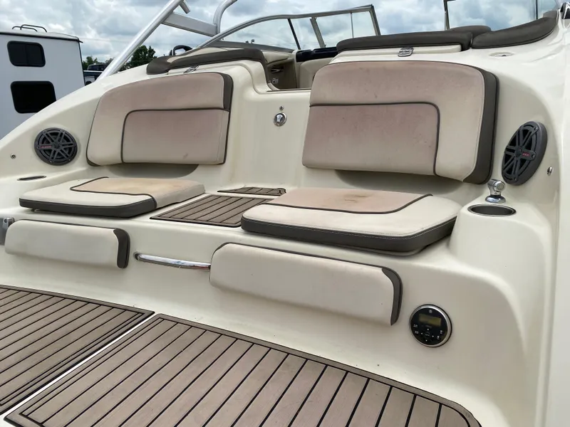 Slide: The Image of 2014 Yamaha Boats 242 Limited S, rear seating area with cushioned seats and speakers. - 34