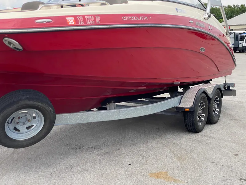 Slide: The Image of Red 2014 Yamaha Boats 242 Limited S on trailer, side view. - 40