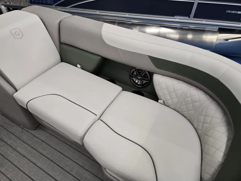 Slide: The Image of 2025 Godfrey Sweetwater 2086 C boat interior with plush seating and speaker system. - 10