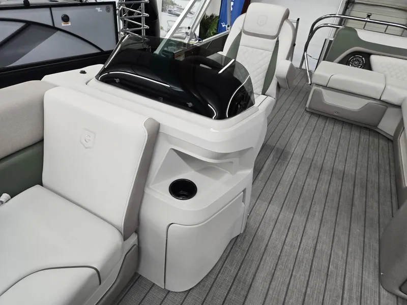 Slide: The Image of 2025 Godfrey Sweetwater 2086 C boat interior with modern seating and sleek design. - 11