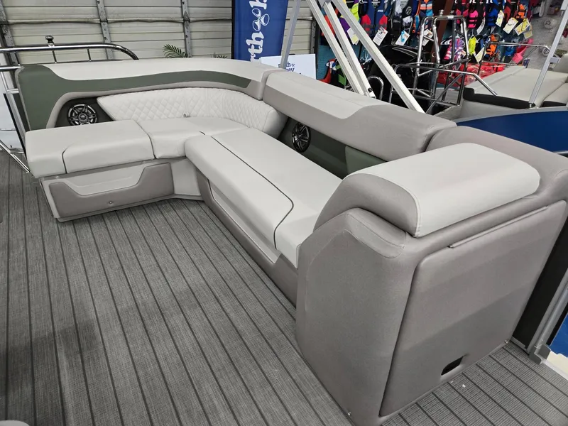 Slide: The Image of 2025 Godfrey Sweetwater 2086 C pontoon boat interior with plush seating. - 13