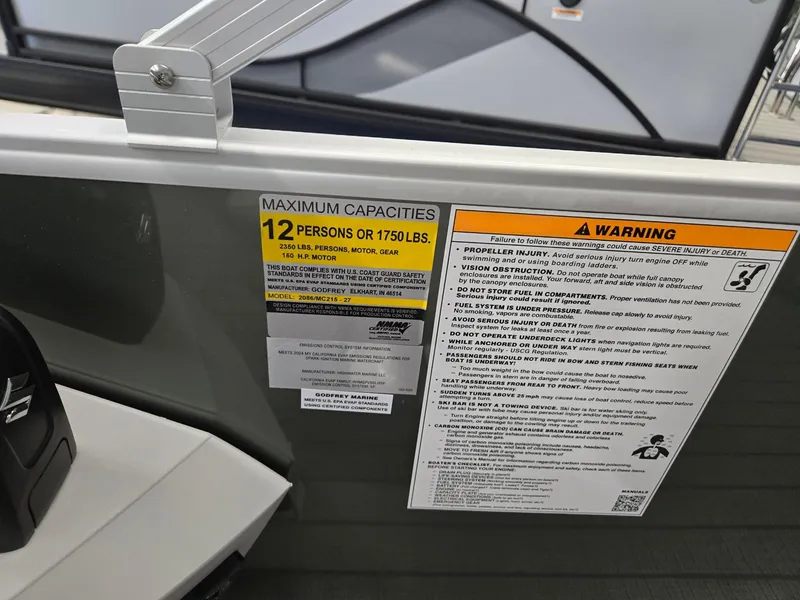 Slide: The Image of Capacity and warning labels on 2025 Godfrey Sweetwater 2086 C boat. - 19