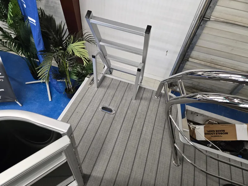 Slide: The Image of 2025 Godfrey Sweetwater 2086 C boat deck with ladder and railing. - 25