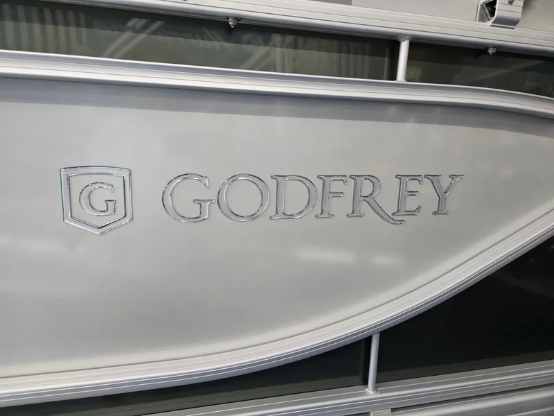 Slide: The Image of 2025 Godfrey Sweetwater 2086 C boat logo on side panel. - 37