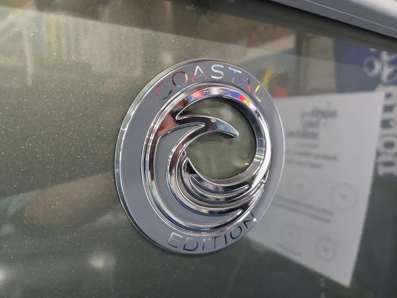 Slide: The Image of 2025 Godfrey Sweetwater 2086 C Coastal Edition emblem on boat exterior. - 38