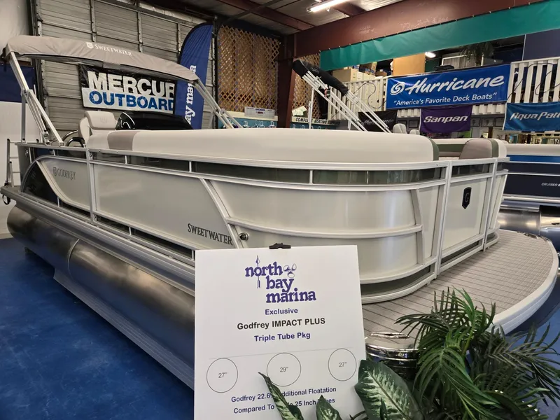 Slide: The Image of 2025 Godfrey Sweetwater 2086 C pontoon boat displayed at North Bay Marina. - 4