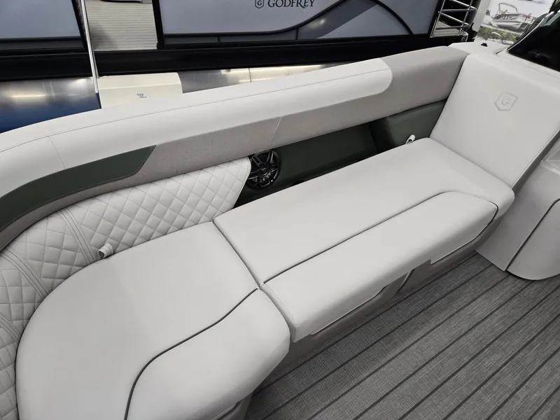 Slide: The Image of Luxurious seating on 2025 Godfrey Sweetwater 2086 C boat, featuring elegant quilted upholstery. - 9