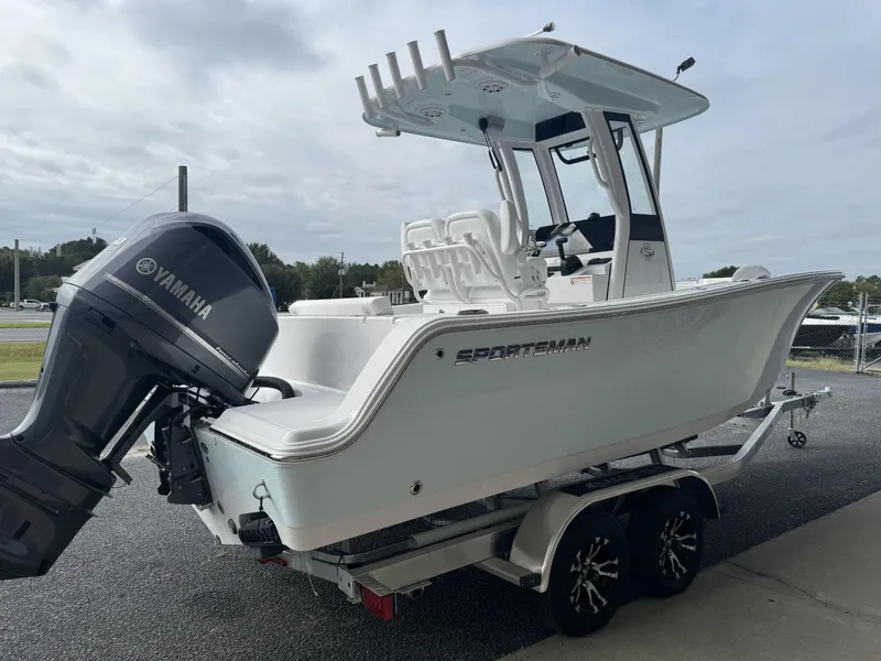 Slide: The Image of 2025 Sportsman Open 212 Center Console boat with Yamaha engine on trailer. - 6