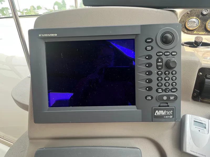 Slide: The Image of Furuno NAVnet display on 2001 Cruisers Yachts 3870 Express dashboard. - 10