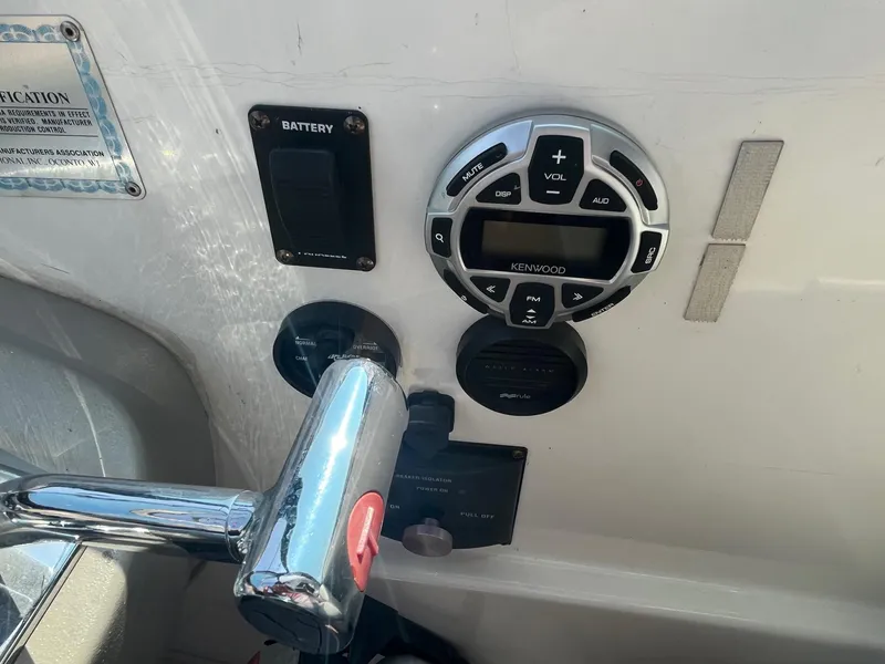 Slide: The Image of Control panel of 2001 Cruisers Yachts 3870 Express with Kenwood audio system. - 13