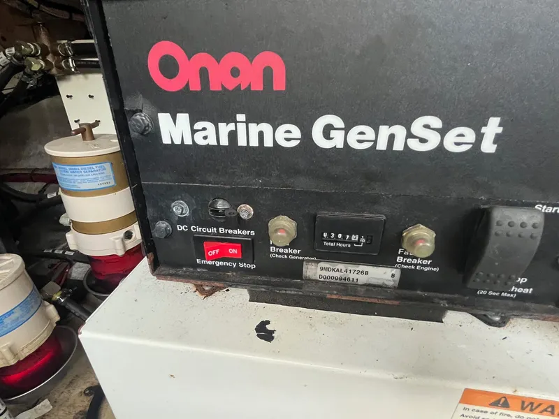 Slide: The Image of Onan Marine GenSet in 2001 Cruisers Yachts 3870 Express engine room. - 34