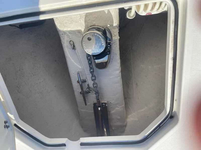 Slide: The Image of Anchor chain compartment of 2023 Cobia 320 CC boat. - 20