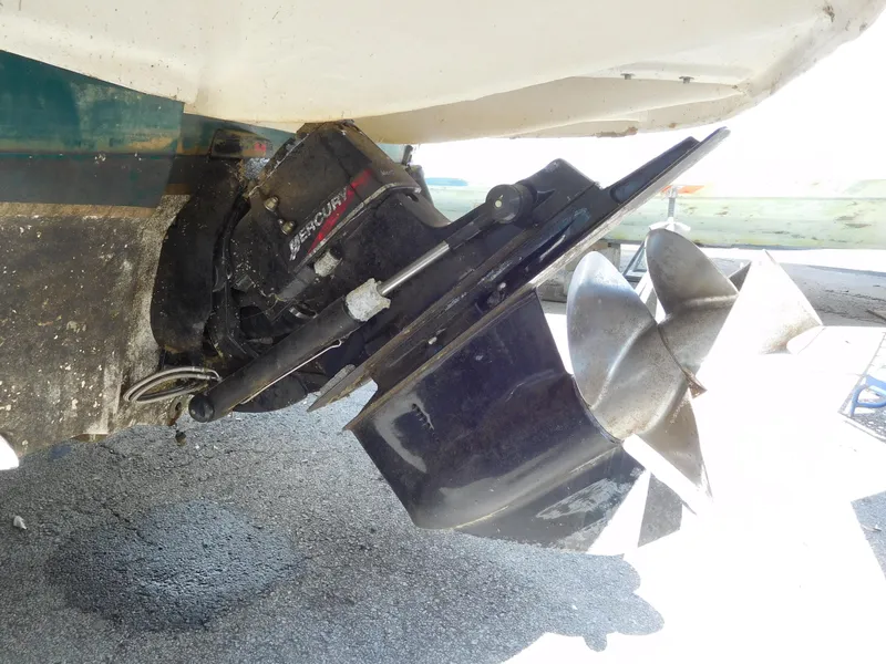 Slide: The Image of Close-up of 2002 Sea Ray 240 Sundeck boat propeller and outdrive. - 21