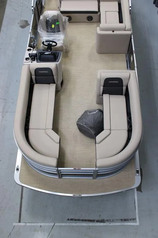 Slide: The Image of 2025 Harris CRUISER 230 SL pontoon boat with spacious seating and modern design. - 3