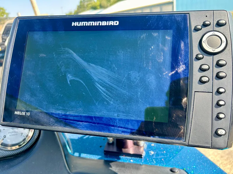 Slide: The Image of Humminbird Helix 10 fish finder on a 2005 Skeeter WX 1880 boat dashboard. - 22