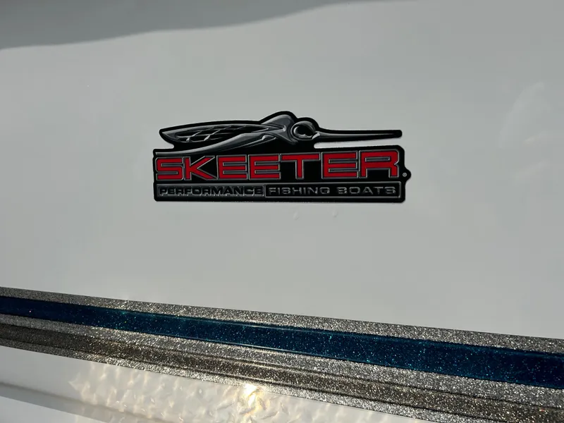 Slide: The Image of Skeeter WX 1880 2005 logo on boat hull, featuring sleek design and branding. - 25