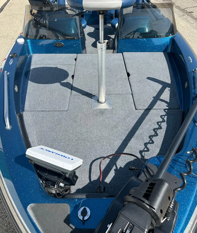 Slide: The Image of 2005 Skeeter WX 1880 boat deck with trolling motor and electronics. - 36