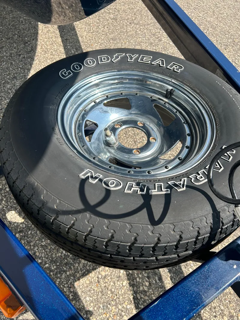 Slide: The Image of Goodyear Marathon tire on a 2005 Skeeter WX 1880 trailer. - 39