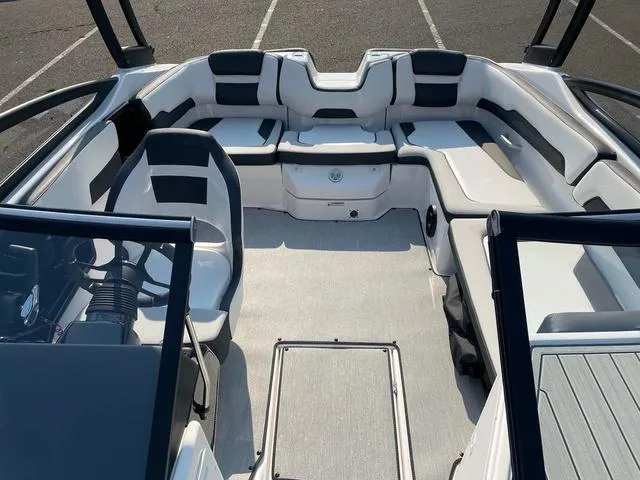 Slide: The Image of 2025 Yamaha AR195 boat interior with sleek seating and modern design. - 4