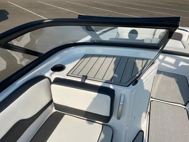 Slide: The Image of 2025 Yamaha Boats AR195 interior with sleek seating and modern design. - 7