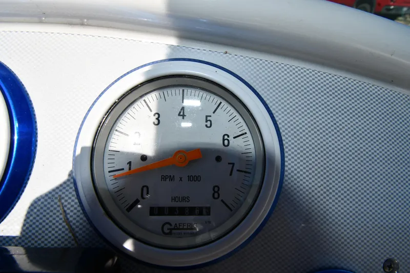 Slide: The Image of Tachometer of 2003 Formula 353 FASTech boat, displaying RPM and hours. - 12